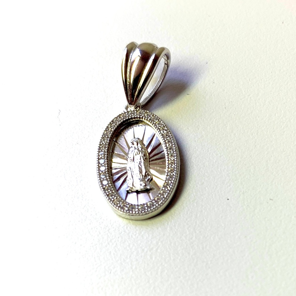 Sterling silver virgin Merry pendant.